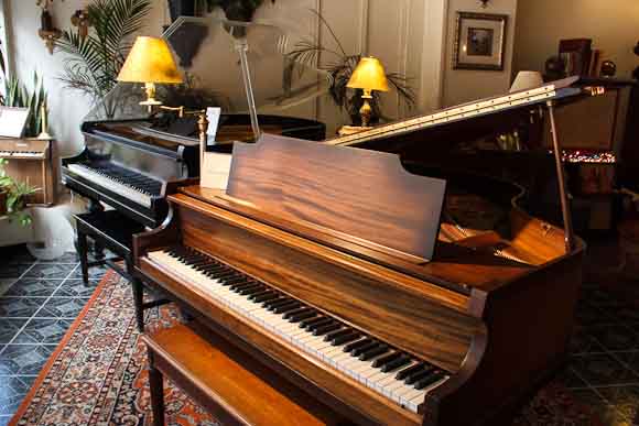 Pianos on display in the front window