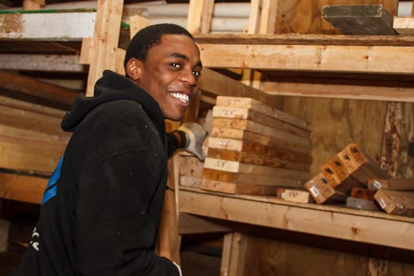 Tinashe Chaponda sorting lumber