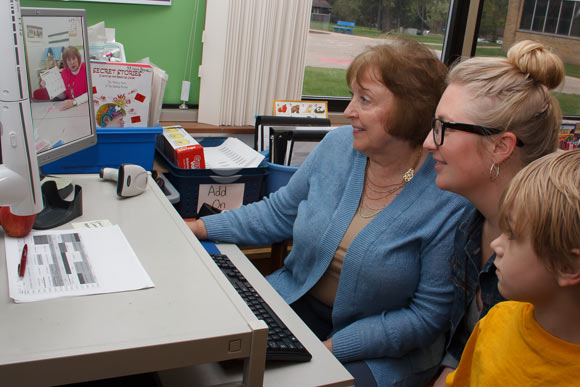 Mrs. Buckley (left) demonstrating videos