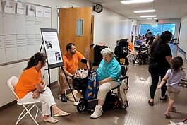 Attendees took part of DAKC's Celebration of ADA took part in a checkpoint activity to learn about the history of the Disability Movement. 