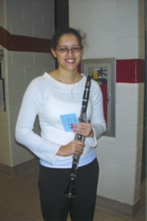 Megan Howe (nee' Fuchs) was on the basketball team at Dexter High School, and played clarinet.
