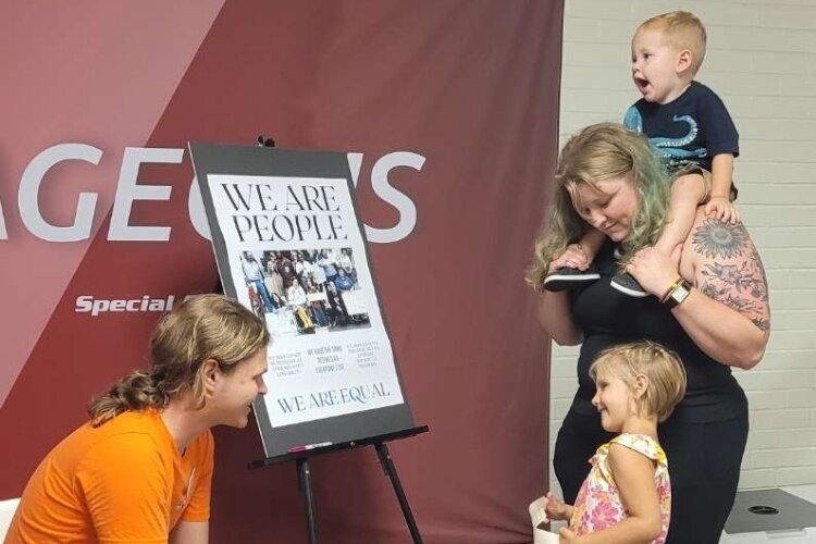 Attendees learn about the history of the passage of the ADA in 1990.