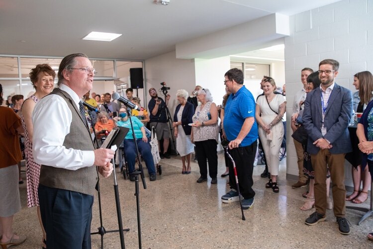 David Bulkowski, executive director of Disability Advocates of Kent County, thanks community members for attending the ribbon-cutting for the new home for Special Olympics Michigan (SOMI). 