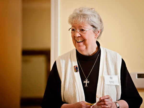 Nancy Betts helps run a meeting of Women Who Care.