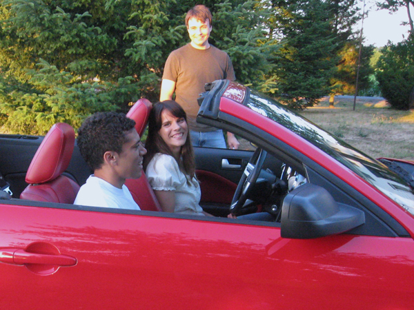 Director Bannon Backhus and actors Dana Blackstone and Bello Pizzimenti share a laugh on the set.