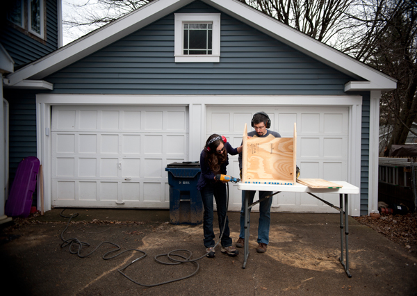 Hannah Lane-Davies and her dad Aaron work on putting together a library box.