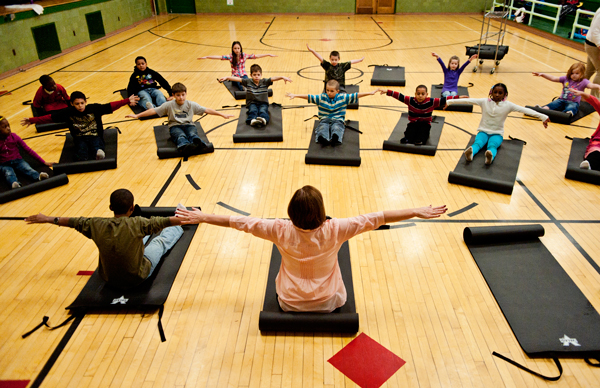 Kids at Prarieview Elementary School participate in morning yoga