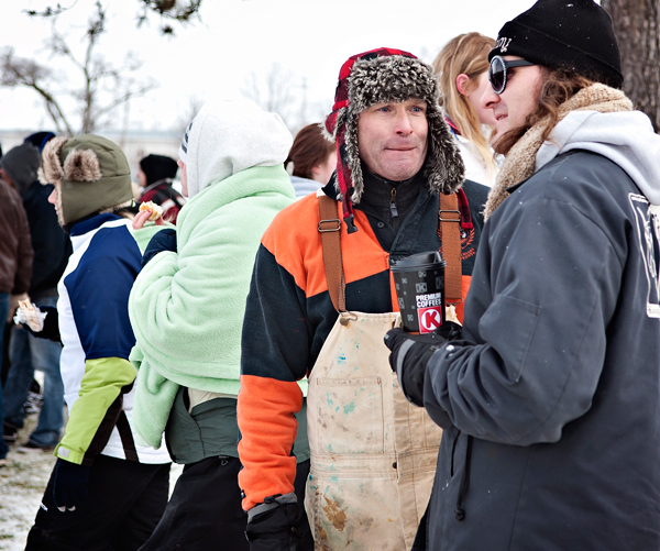 Tim Britain, left, helps organize the Annual Snowball Rugby Tournament.
