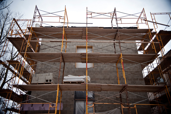 Scaffolding hides the new addition and renovation of the Ladies Library Association