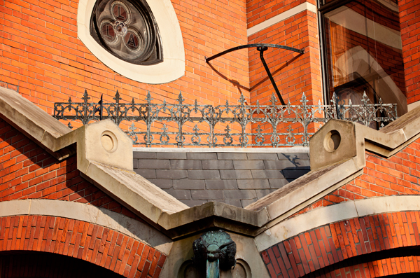 Beautiful windows and ornaments that adorn the front of the Ladies Library Association