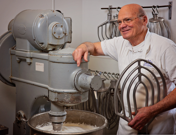 Karel Boonzaaijer still helps out in the bakery