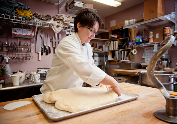 Maria Brennan lays out dough for croissants at The Victorian Bakery