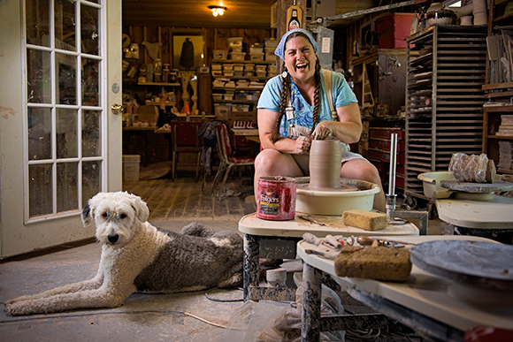Dawn Soltysiak and her dog Samson work at Khnemu Studio