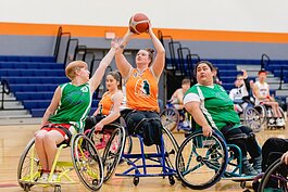 Wheelchair basketball is a highly physical sport, with players often bumping into one another and sometimes flipping their chairs. Yet the players love the thrill of getting a shot at the basket and scoring points.