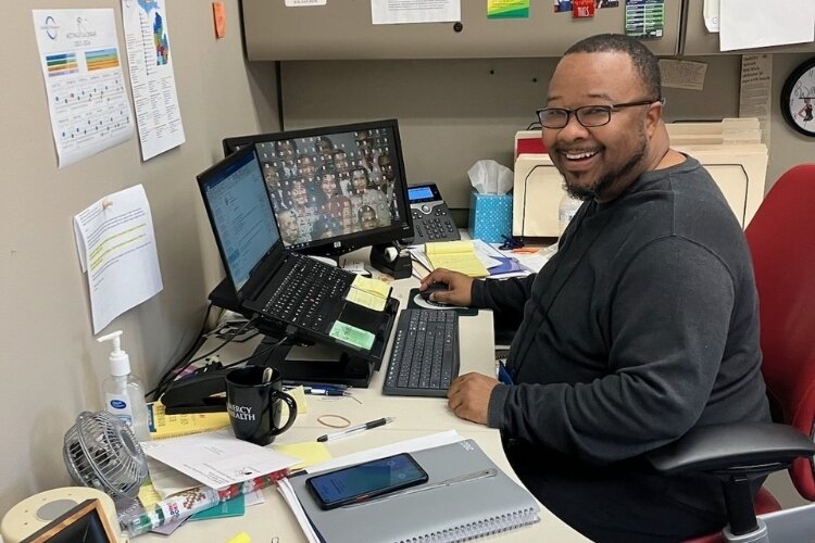 Will Wilson at his desk at DNWM. 