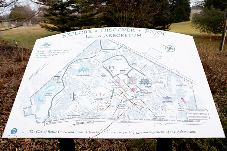 A map helps visitors orient themselves at Liela Arboretum.