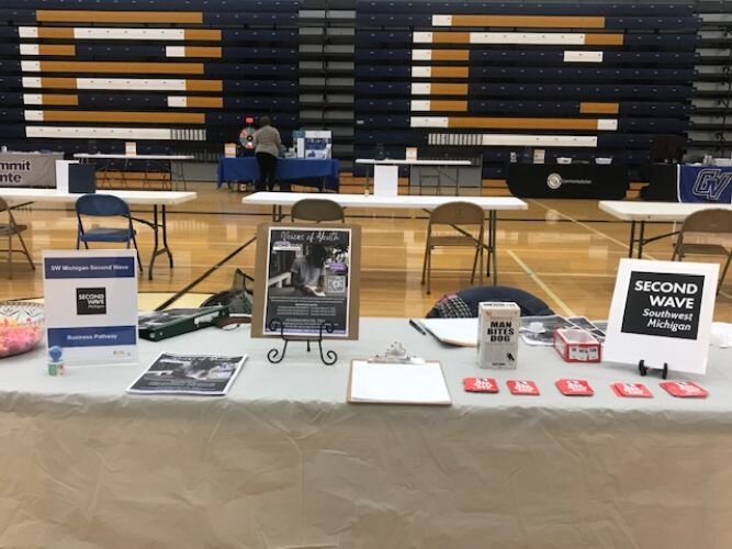 Voices of Youth mentors attended the Battle Creek Central High School career fair in January to speak with interested youth.