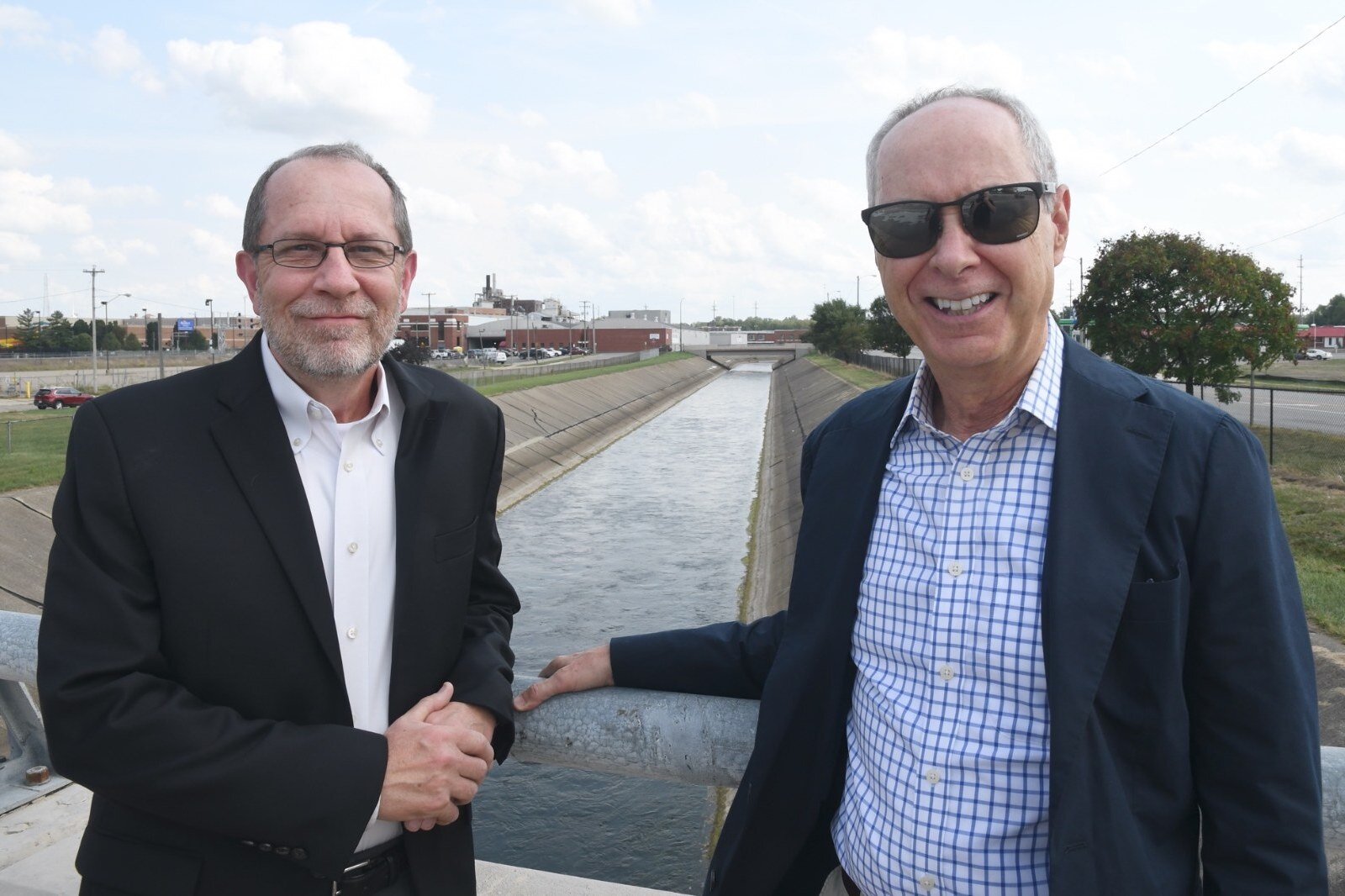 Dave Walters, left, and John Macfarlane are two of the people advocating for a restoration of the Kalamazoo River as it flows south of downtown Battle Creek.