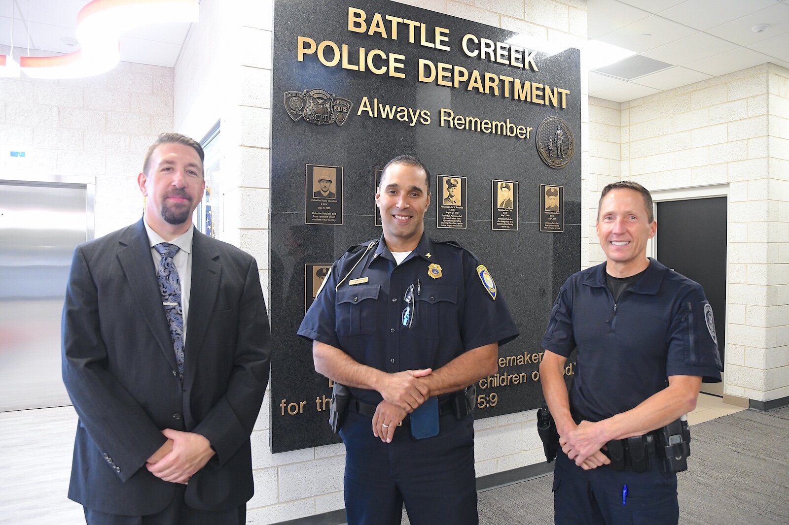 Battle Creek Police Chief Shannon Bagley, center, is seen with Lt. Ryan Strunk, left, and Deputy Chief Doug Bagwell.