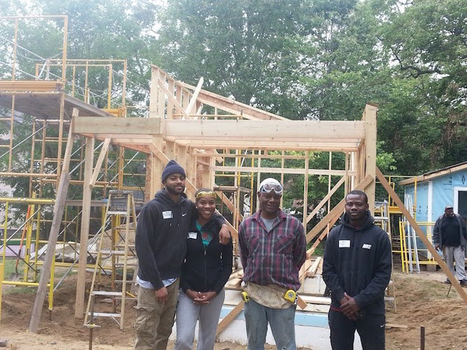 No. 8 Ben Brown and other volunteer builders helped construct the frame of Brown's tiny house.