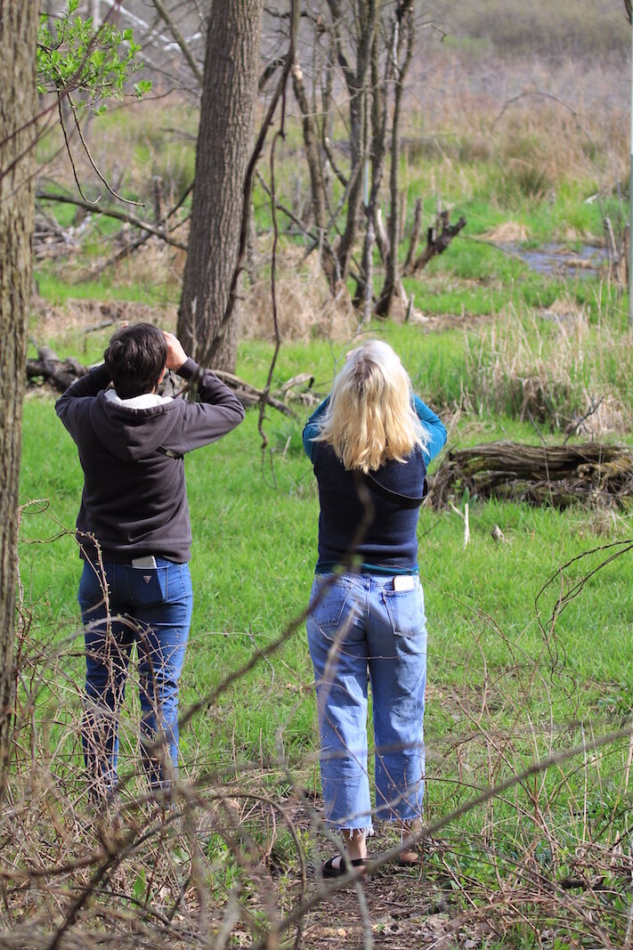 Heather and Molly Ratliff share a moment looking at birds in the Kleinstuck Preserve.