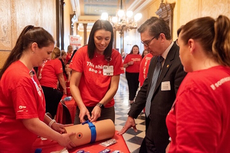 Health care professionals met during Michigan Stop the Bleed Advocacy Day, May 23, 2019 and conduct a Stop the Bleed demonstration at the State Capitol.