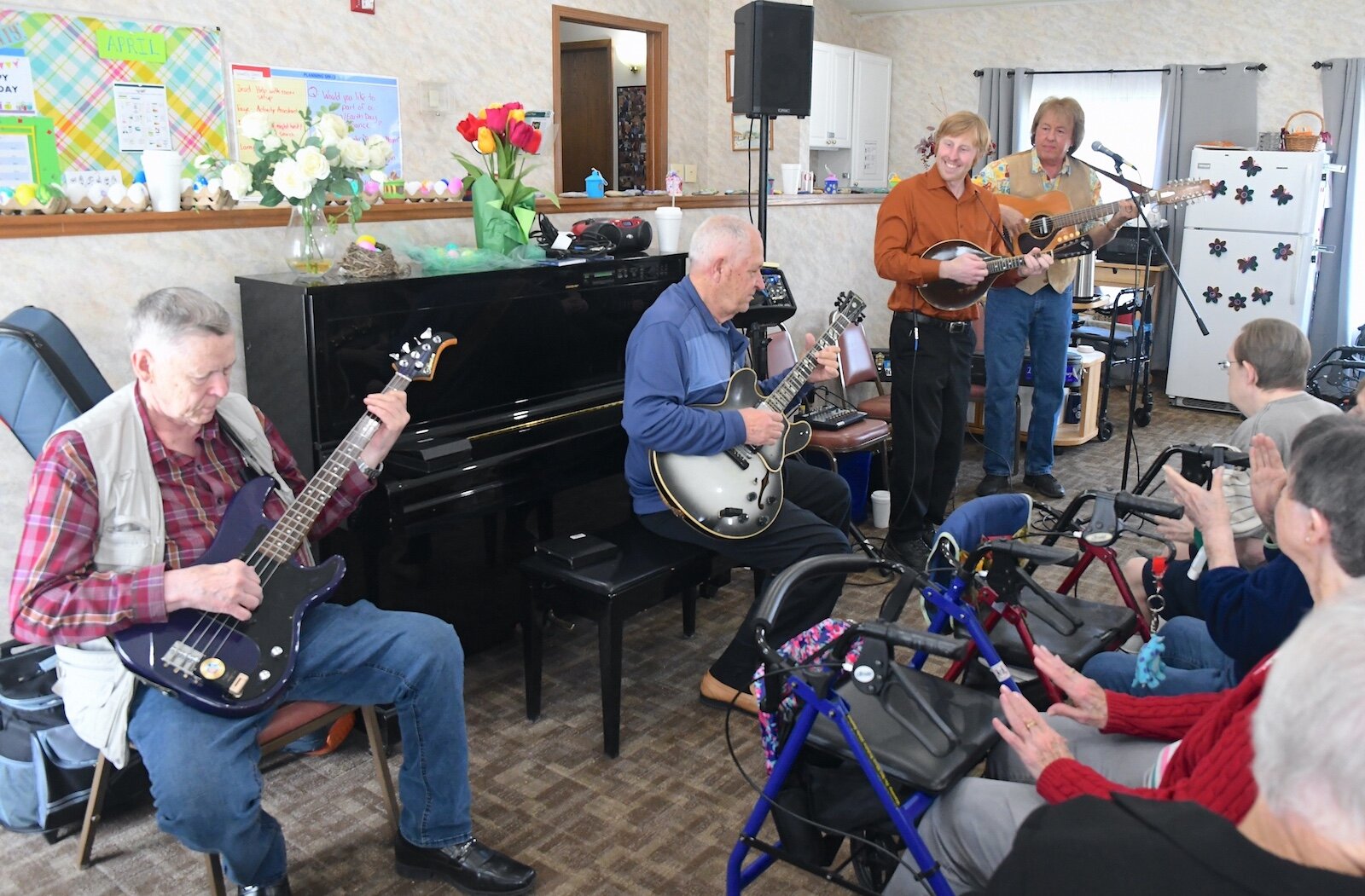 Bob Rowe and the Green Valley Boys play music for residents of Park Place Assisted Living in Kalamazoo.