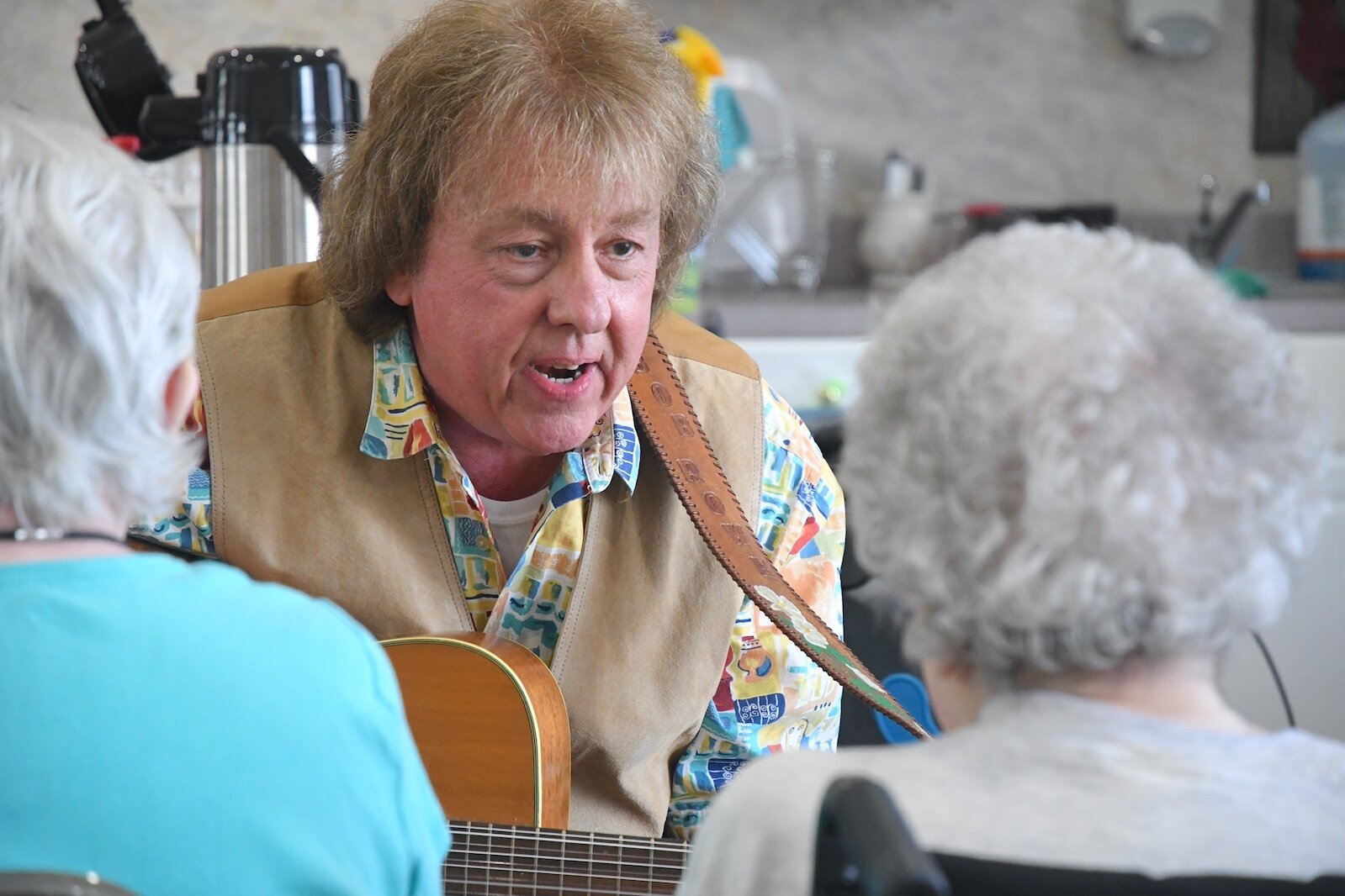 Bob Rowe sings for residents of Park Place Assisted Living in Kalamazoo.