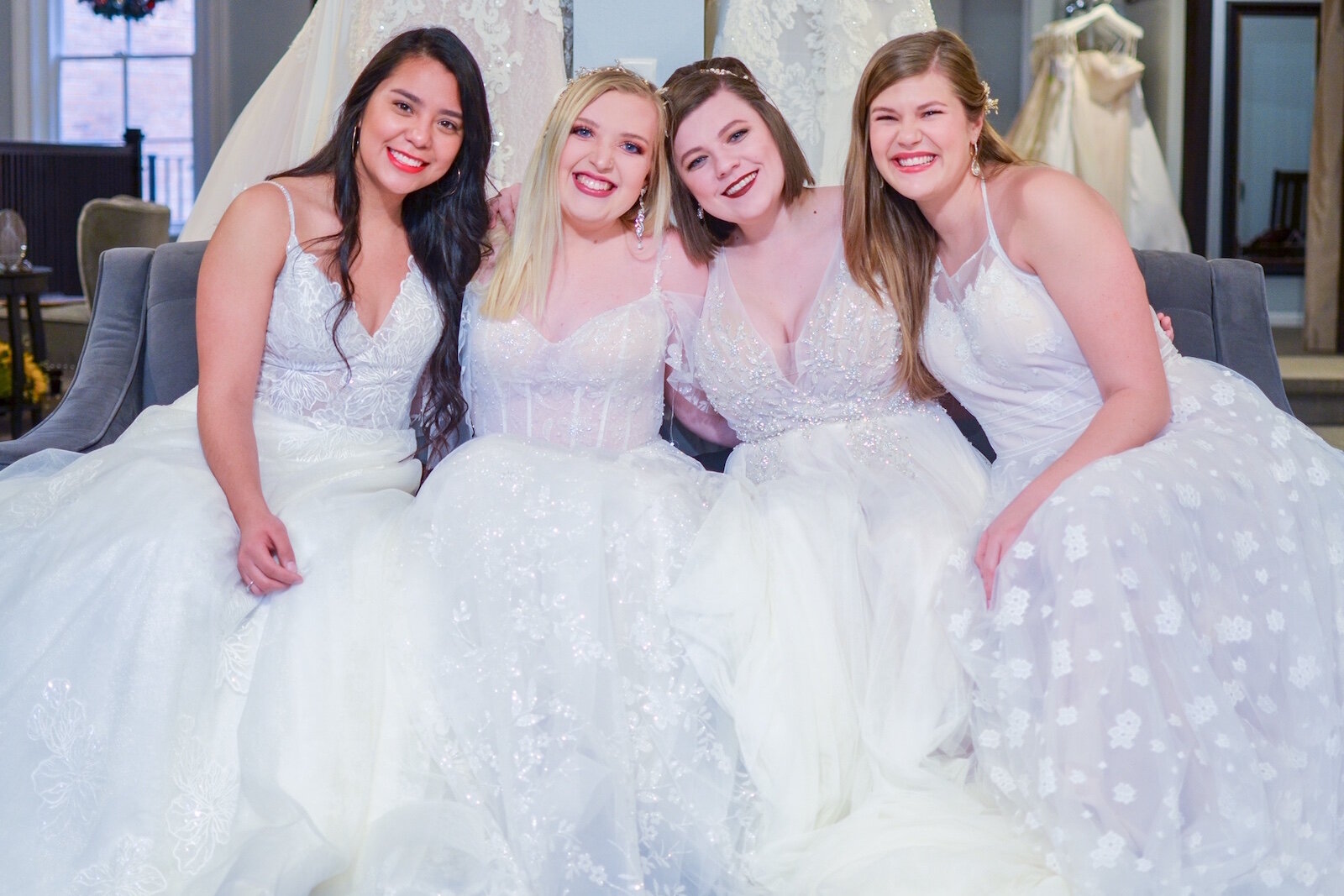 Some of the bridal stylists at Memories Bridal & Evening Wear in Kalamazoo are shown during a social media photoshoot this past December. From left, they are: Margarita Castillo, Jodi Isaacson, Mae Bright and Rachel Hansen.