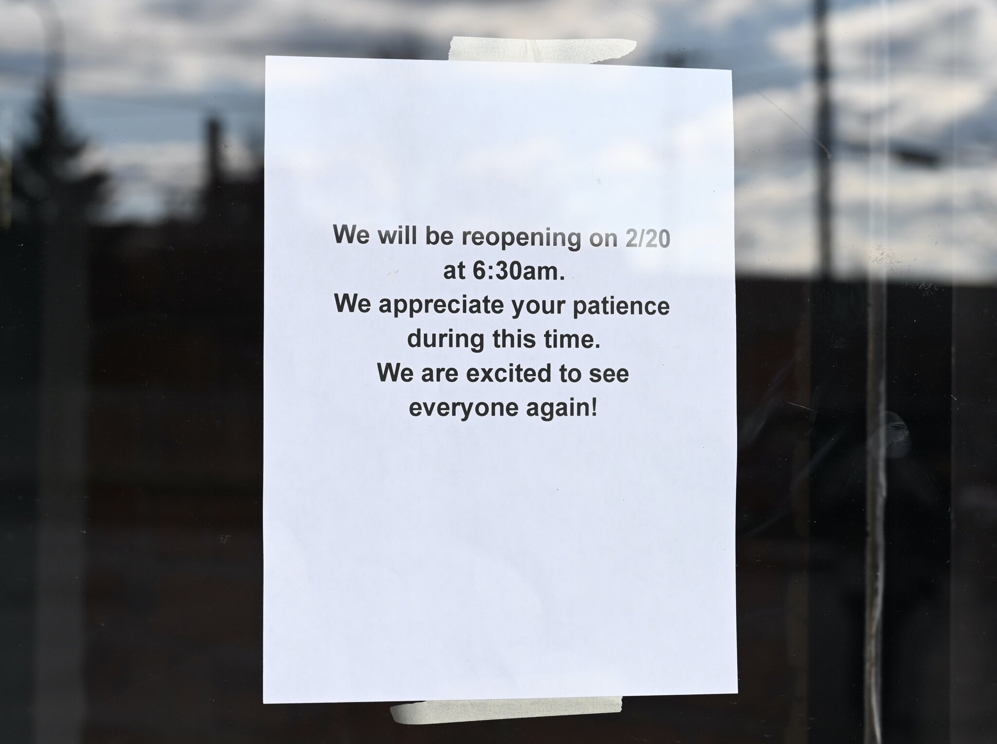 Sign on the back entrance to Cafe Rica indicating that it will re-open on Feb. 20.