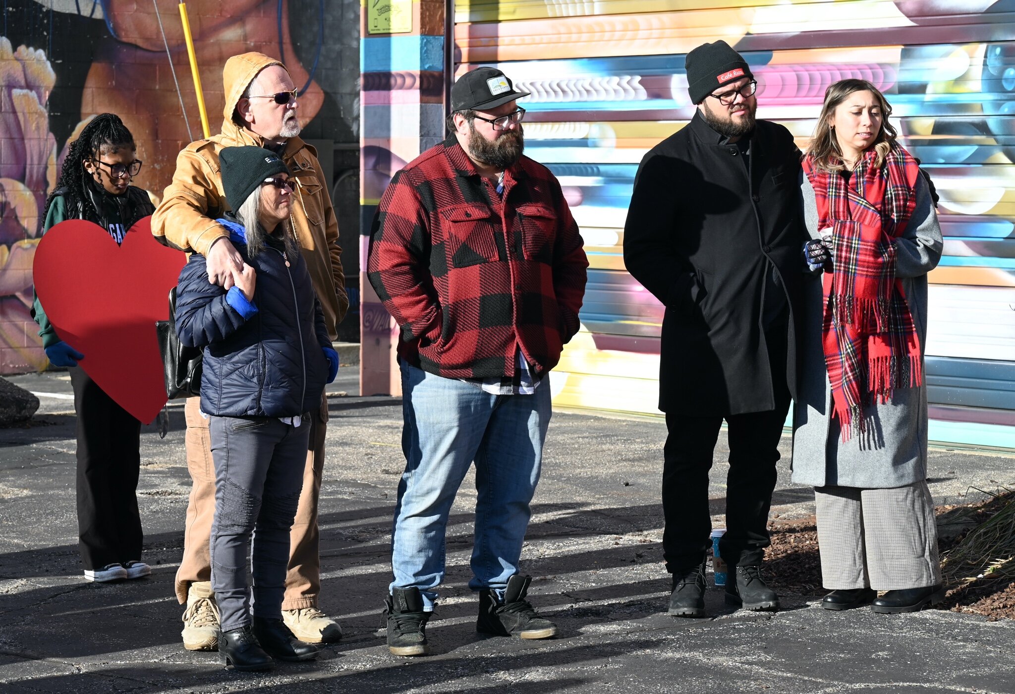 The Bredehoft family of Cafe Rica are seen at Sunday’s vigil.