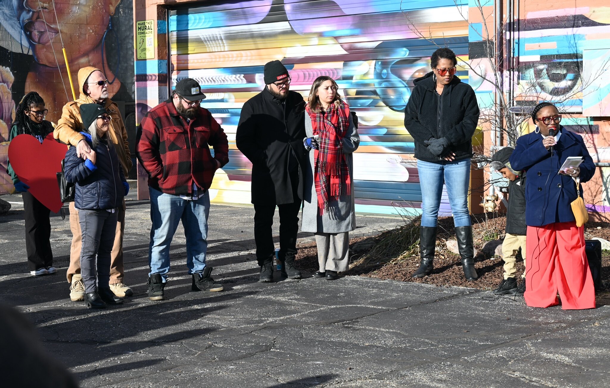 The Bredehoft family of Cafe Rica are seen at Sunday’s vigil.