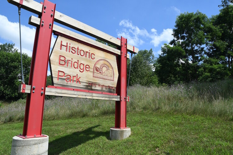 The entrance to Historic Bridge Park off Wattles Road in Emmett Township.