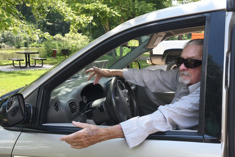 Robert Byrd, originally from Battle Creek, enjoys the peacefulness of Historic Bridge Park.