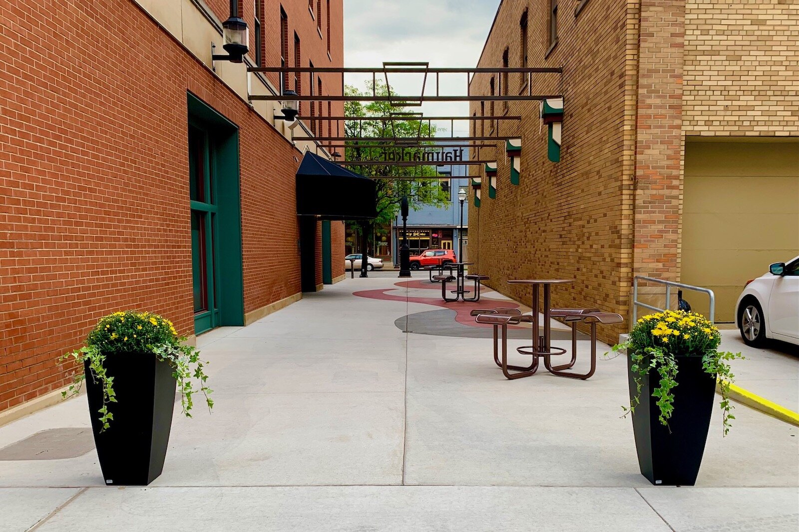 This is an image of the former Whiskey Alley (now a part of Haymarket Plaza) looking south towards East Michigan Avenue.