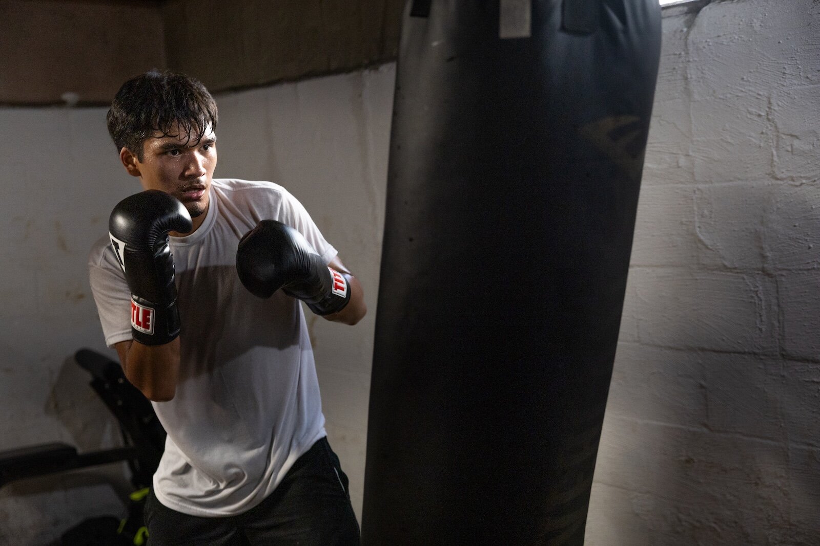 Alexander Lopez, 17, Kalamazoo, squares up with a punching bag at Champ’s Den. “I have been training here for about 3 or 4 months, and I’ve been training as a boxer for almost 2 years. I trust Coach Ja’s ability to train."