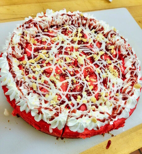 A strawberry crunch cheesecake by Huey D’s Goodies.