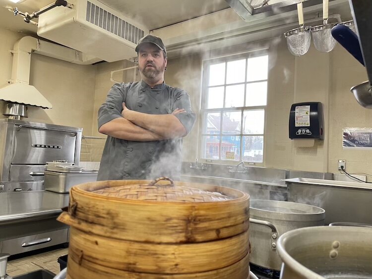 Ramen Chef Anthony Cox stands in his ghost kitchen in Albion.