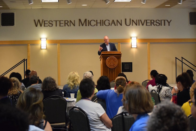 Chris Sargent addresses a crowd at a time before COVID-19