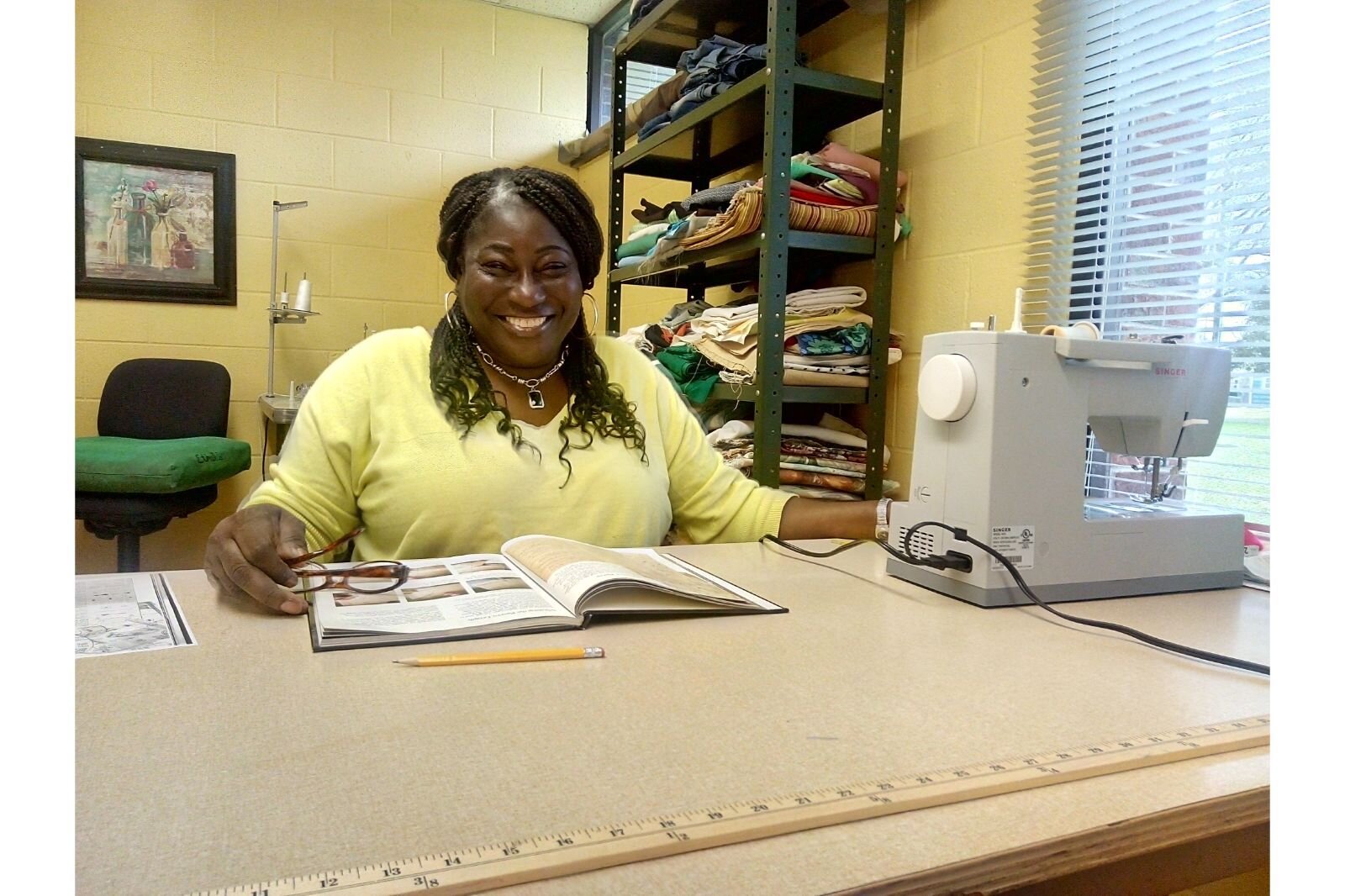 Learning industrial sewing The Women's Co-op.