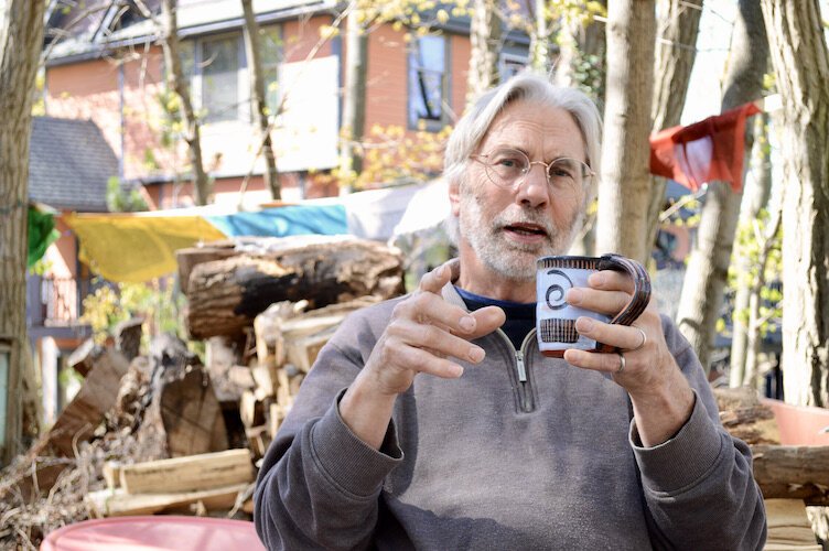 Tom Kostrzewa, president of the board of what was Colleagues International, has hosted many discssions around his kitchen table.