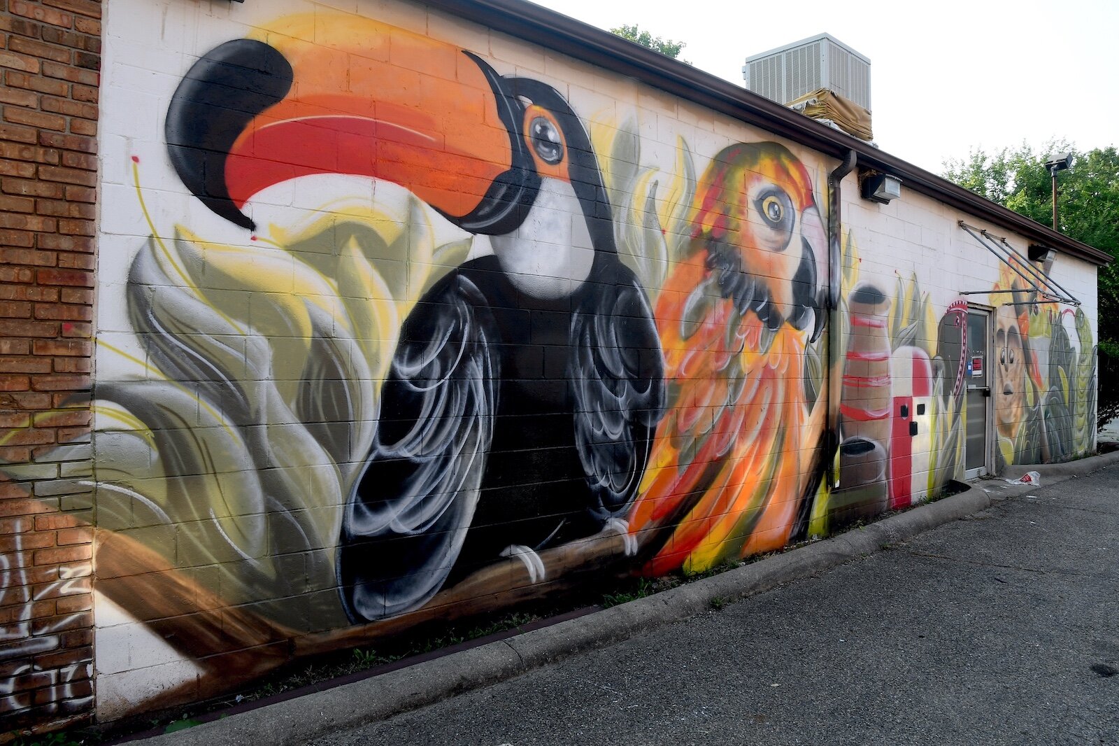 Jaziel Pugh’s mural on a wall of the Calhoun Laundry is nearing completion.