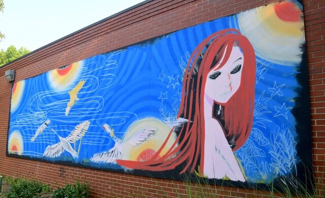 Teaira Gray of Battle Creek painted this mural on the wall of the Art Center of Battle Creek.