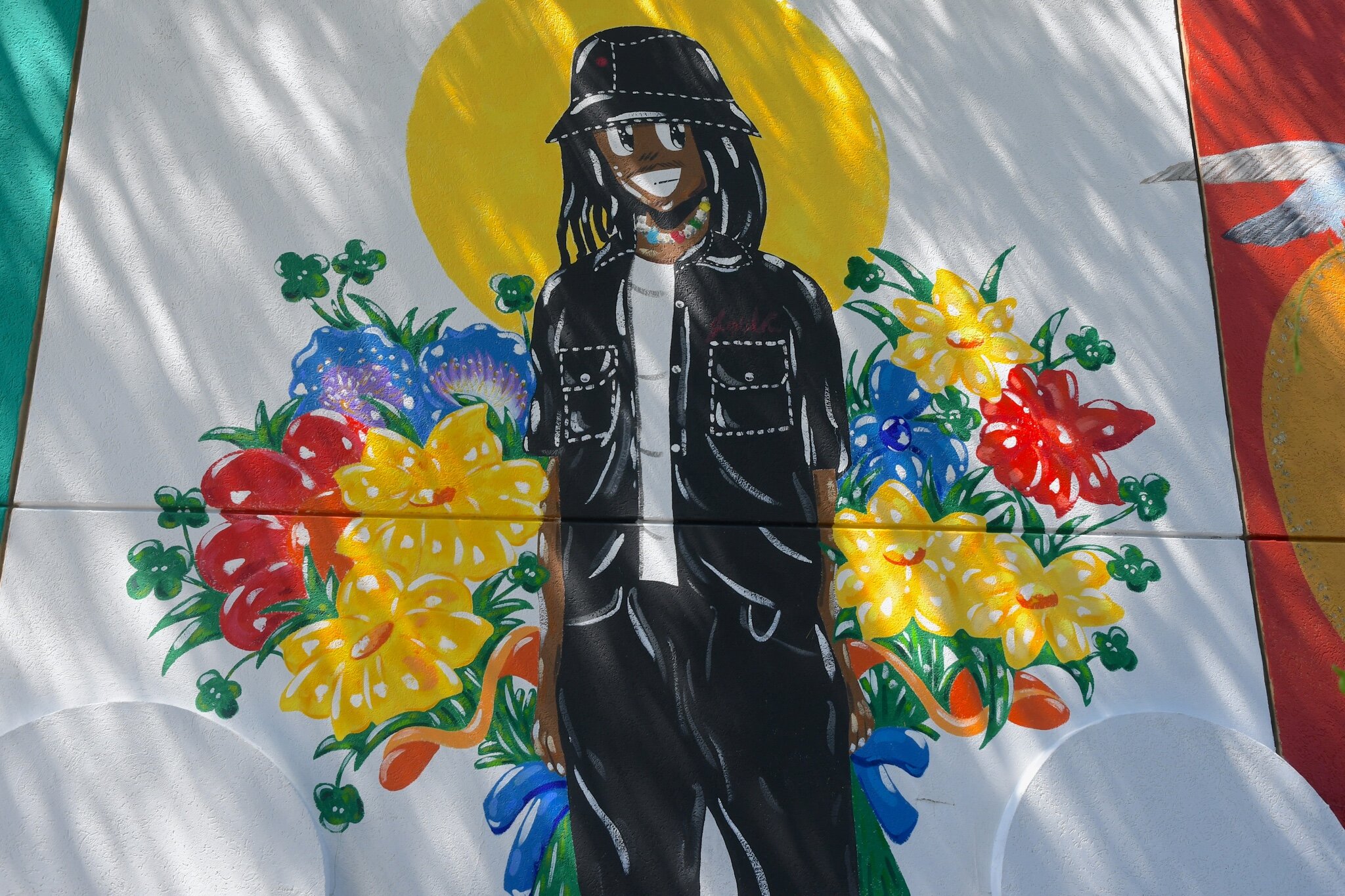 Close up scenes of David Eldred’s mural on a wall of The Arc in downtown Battle Ceek.