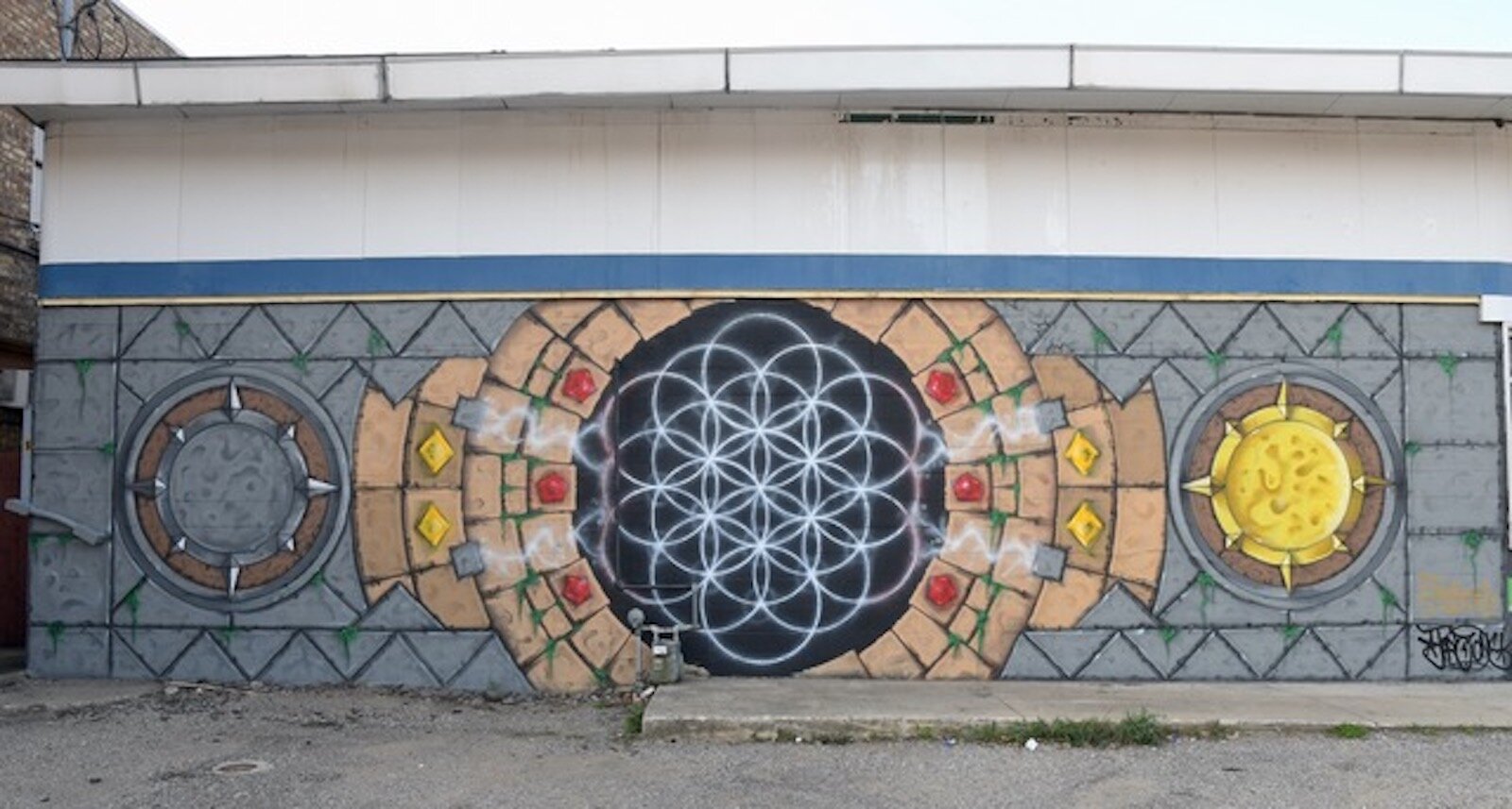 Overall view of Jars’ mural on the wall of the K and A Food Mart.