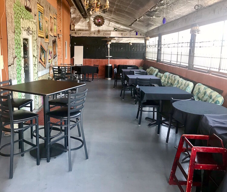 A seasonal sitting area on the east side of Comensoli’s was temporarily enclosed to accommodate up to 24 patrons based on Social distancing limits ordered by the state helped Comensoli’s.