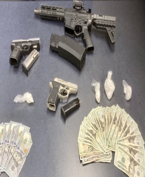These are images of guns, drugs, and cash that were confiscated over the last two months by officers with the Kalamazoo Department of Public Safety as they arrested “group involved” shooters in Kalamazoo.