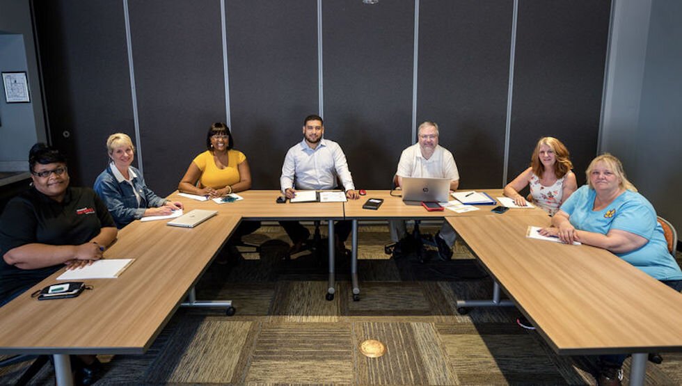 Staff from organizations making up the Workforce Development Consortium meeting at Goodwill Industries to discuss ways to better serve businesses and participants in the Battle Creek community.