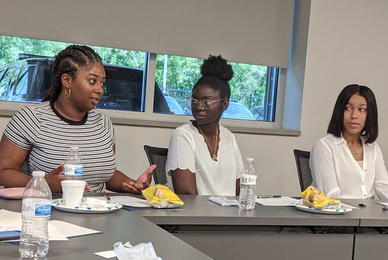 Khyrinn Herring, far left, discusses some of her concerns and what she thinks could be done differently.