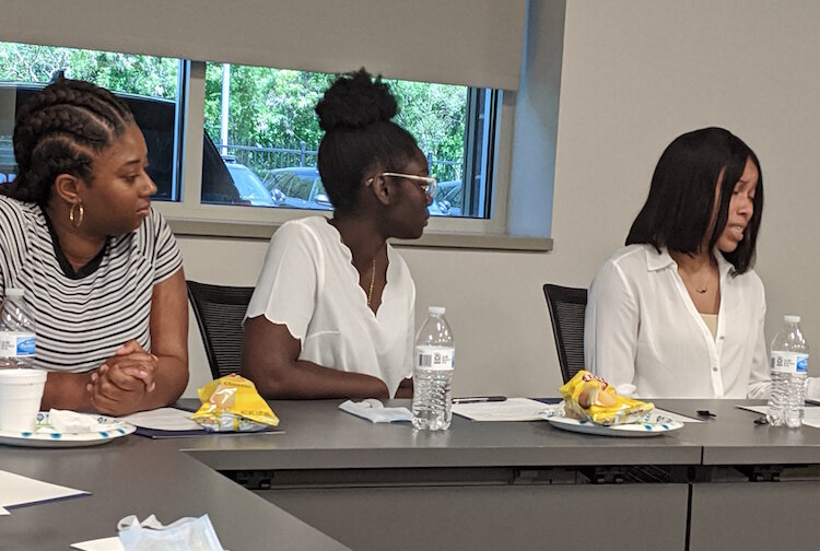 From left: Khyrinn Herring, Sanye Sichinga, and Jenasia Morris were part of a group of a group of young adults who met Wednesday, June 17, with members of the Battle Creek Police Department.